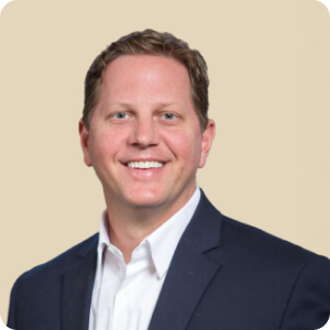 Headshot of athenahealth Chief Customer Officer Chris Kondrat